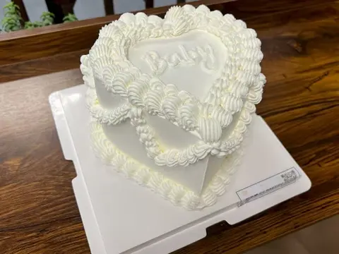 #510 white vintage heart shaped cake with ornate piped ruffles and center message by KK Bakery in Rosemead