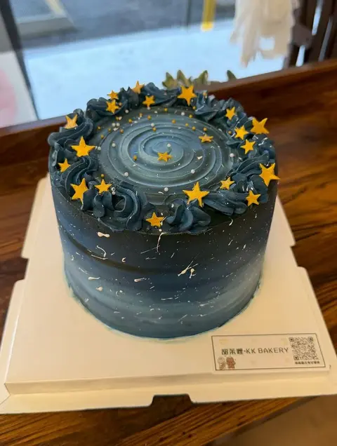 #513 dark blue galaxy cake with zodiac design, gold stars and moon decorations by KK Bakery in Rosemead