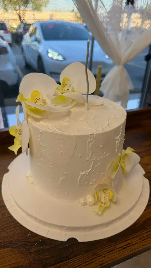 #525 white floral cake with yellow butterflies, flowers and delicate pearl details by KK Bakery in Rosemead
