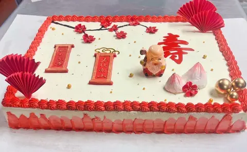 #529 Chinese longevity sheet cake with Shou character, longevity figure, peach and red Chinese decorations by KK Bakery in Rosemead