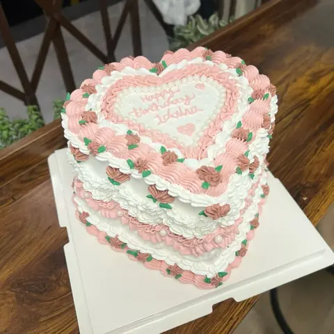 #566 vintage heart shaped cake with pink and white piped borders by KK Bakery in Rosemead