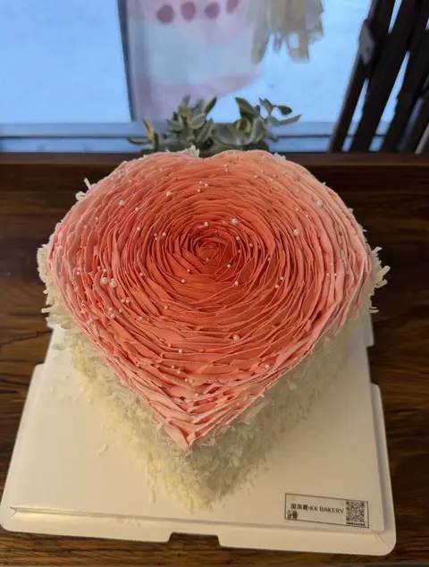 #588 white cake topped with a large red heart made from textured buttercream by KK Bakery in Rosemead