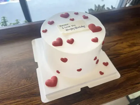 #592 white cake with pink heart decorations and romantic message by KK Bakery in Rosemead