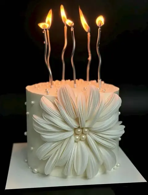 #601 white birthday cake with a large pleated buttercream flower and pearl center, custom made by KK Bakery in Rosemead