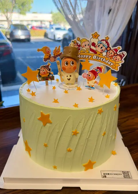 #606 Paw Patrol inspired birthday cake with character toppers and orange stars by KK Bakery in Rosemead