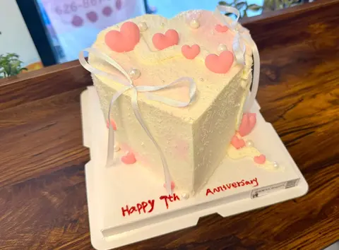 #607 pink anniversary cake with heart decorations and white chocolate drip by KK Bakery in Rosemead