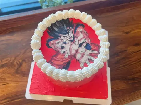 #623 red Dragon Ball inspired birthday cake with printed anime character image and white piped border by KK Bakery in Rosemead
