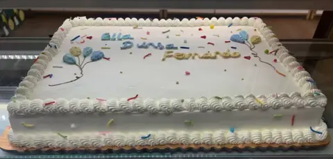 #628 large white celebration sheet cake with balloons, colorful sprinkles and piped border by KK Bakery in Rosemead