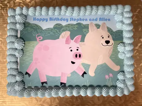 #630 rectangular birthday photo cake with a pink pig and tan dog illustration by KK Bakery in Rosemead